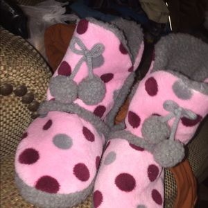 Pink boots with poka dots all over